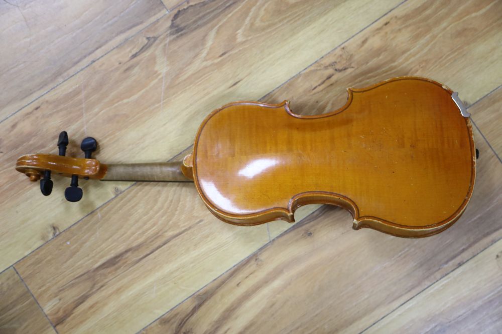 An early 20th century Czechoslovakian 3/4 size violin, bears fake Stradivarius label, cased